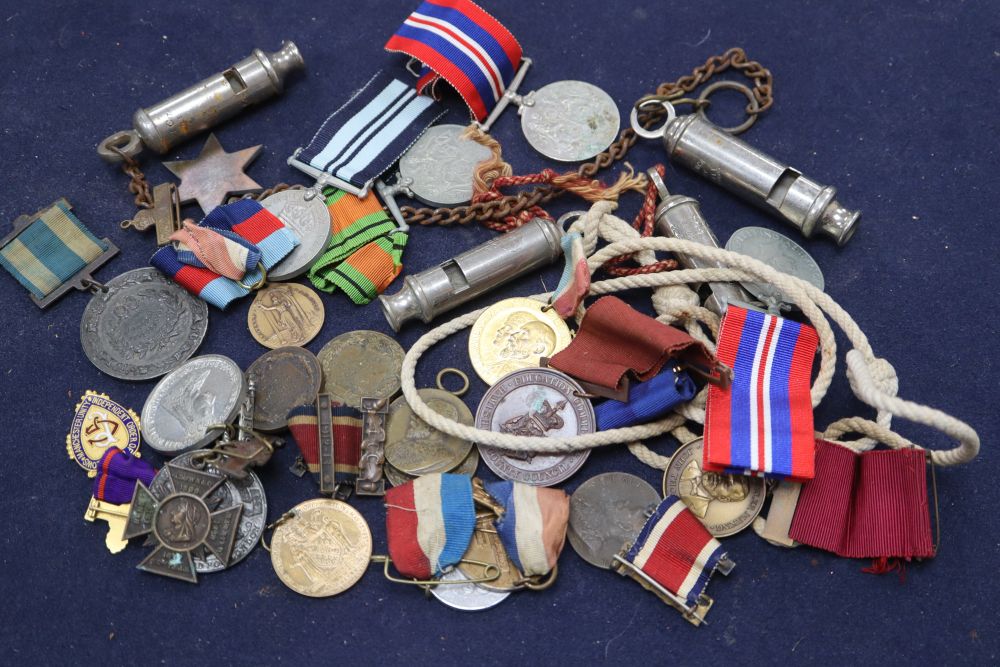Assorted medals, medallions and ARP whistle and other whistles
